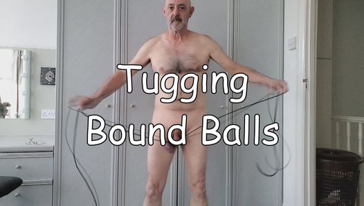 Tugging Bound Balls