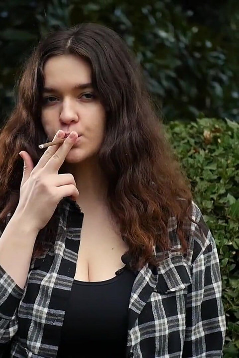 Sweet and Busty Russian Babe Smoking Cigarette in Nature