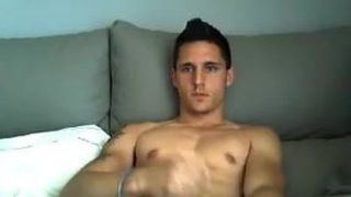 Spanish hunk jerks off and cums all over his hard abs