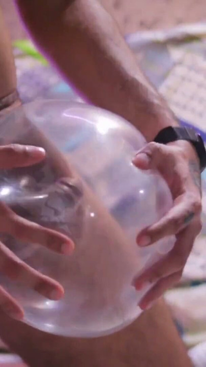 Looner Condom Popping Camilo Brown Popping Inflated Condoms With His Big Uncut Cock And Licks His Own Cum From The Condom | Clip 1