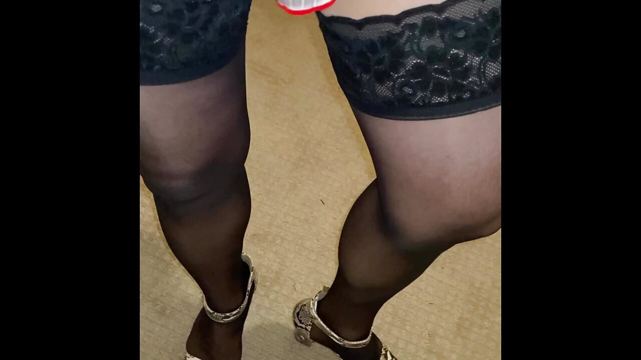 Mom Crossdresser Madison dressing in sexy outfits with thigh high hose stockings and heels and walks around showing off teasing