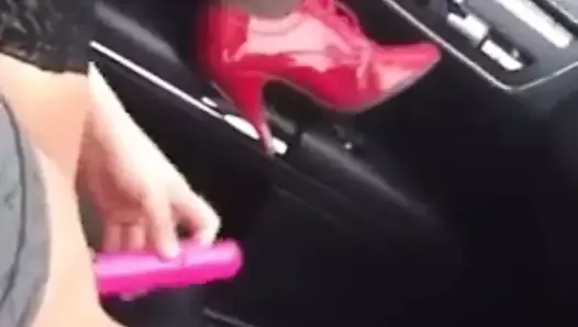 Pink vibrator in car