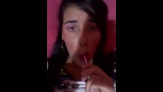 Brazilian girl licking her lolly