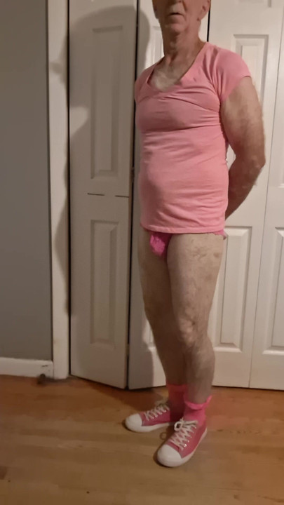 Pretty in pink with a butt plug