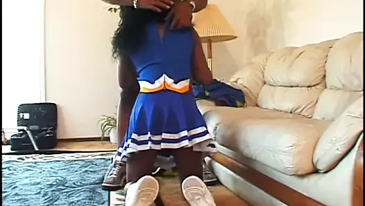 Black cheerleader with perky tits rides a big black cock