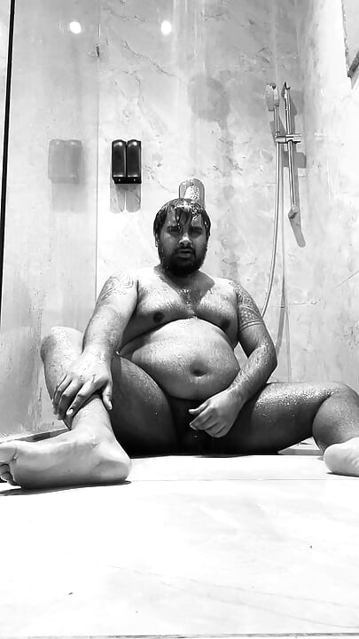 Young bear masturbates while showering