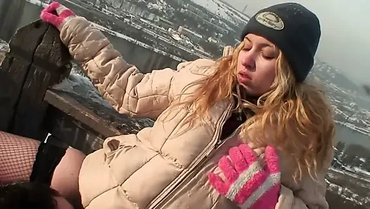 Blonde slut wearing fisnet stockings getting banged in snow outdoors