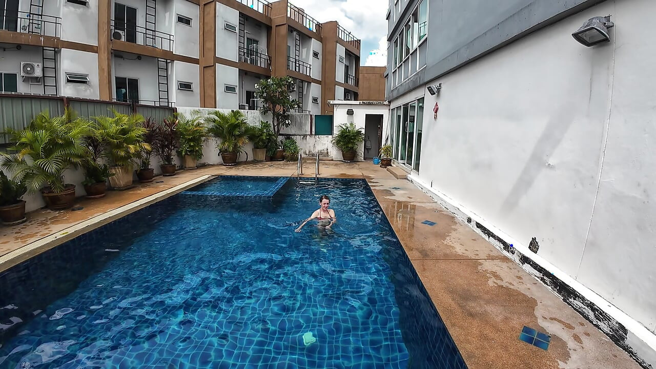 watch us playing in our swimming pool