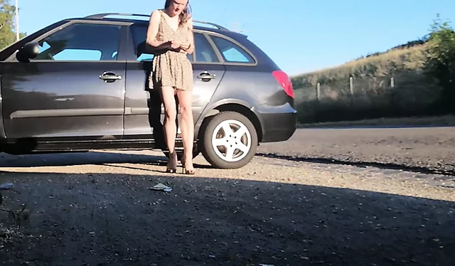 Risky striptease outdoors