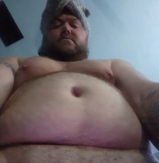 Deep throating purple dildo. Then fucking it.
