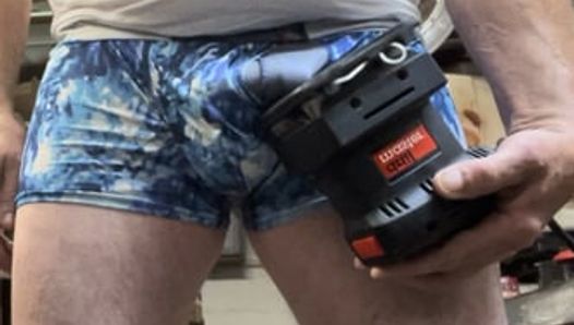 Wood Sander vibrates my his cock to orgasim