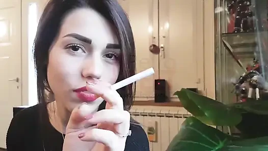Smoking in close up with a beautiful girl