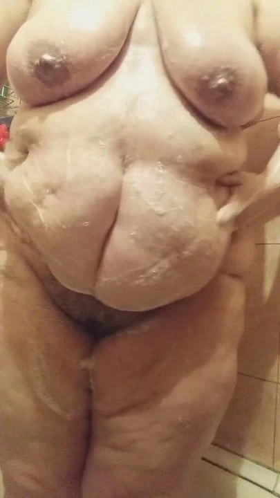 my fat real step mom is stroking her body in the shower