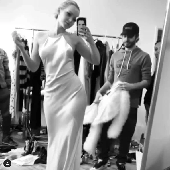 Dove Cameron looking sexy in a sheer white dress