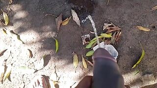 Pissing in the street through the garden