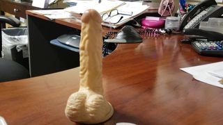 Fucking my ass on my bosses desk.