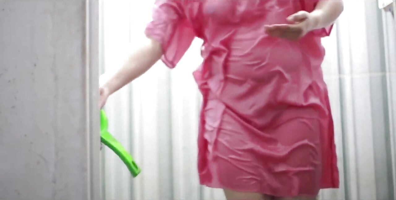 Indonesian Porn Peeping at a Busty Girl Taking a Bath in a Transparent Satin Dress