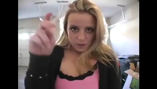 Blonde bitch smoking a cigarette in a close up video