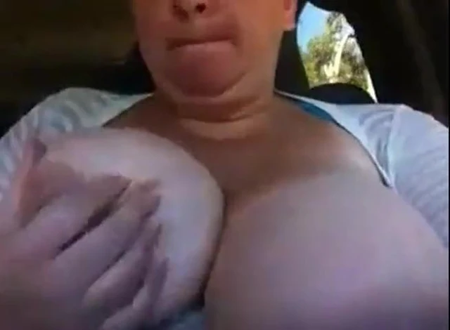 Big tis out while driving  (web find)