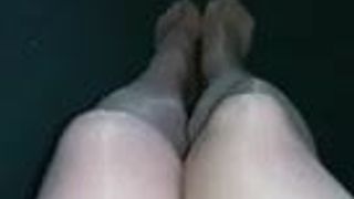 Feet & legs in sheer tights