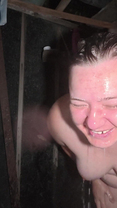 Golden shower at night in an outdoor shower | Clip 1