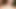 Cher takes a shower and rides a cream colored dildo in bed