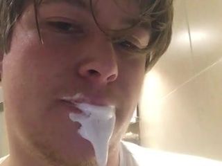 Young guy takes hot facial and spits it back out