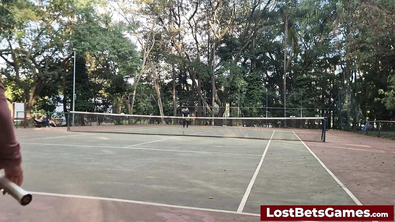 An outdoor strip tennis match with Rafaela and Igor