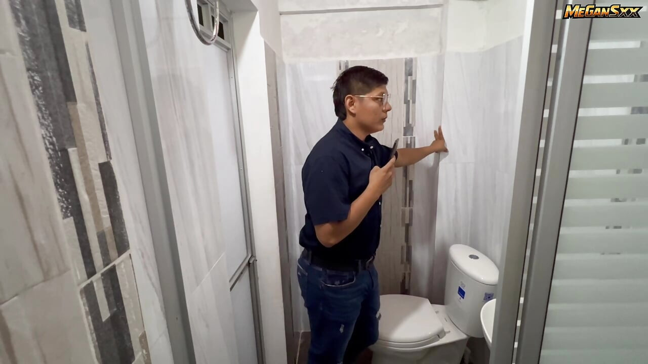 Teacher his student in the bathroom.