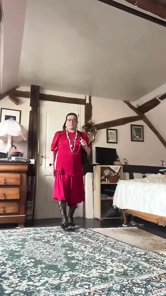 In Sunday dress with a red dress