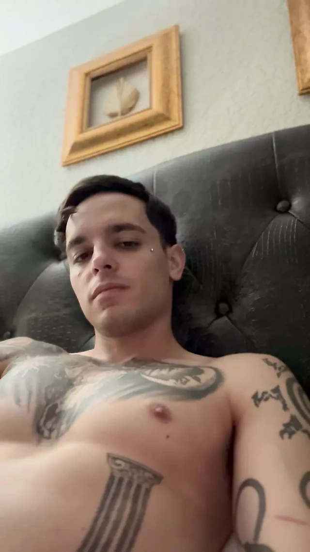 Adult starts to insert piercing into hole and pre
