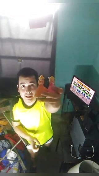 Jesus in boxer playing Mario kart 64 video recorded in 2021