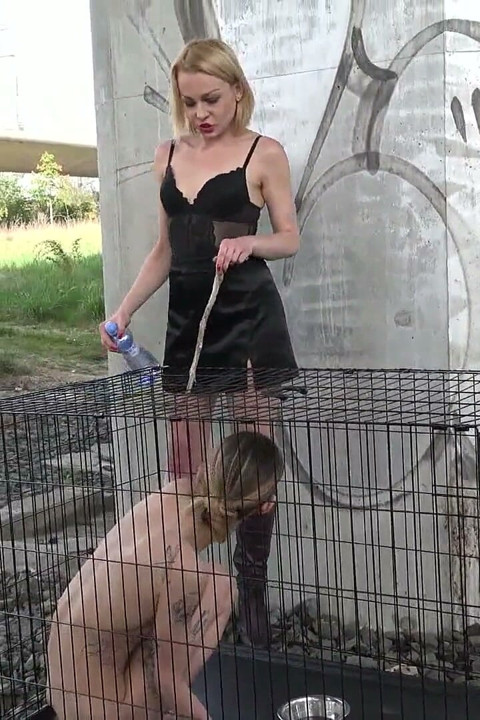 Exposed in the public pillory cage!