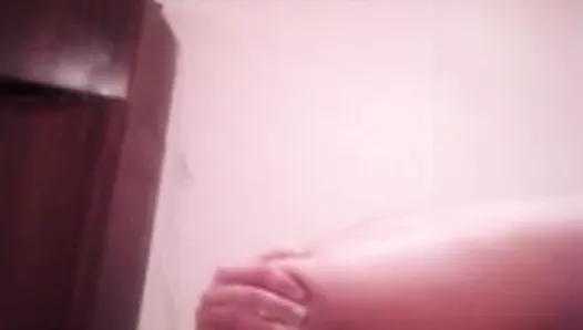 A young mother shoves cream bottle up her ass on self cam