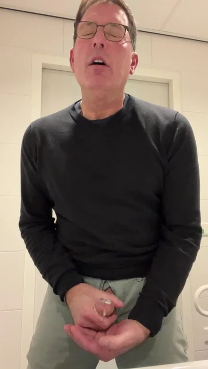 Intense stand up orgasm and cumshot in the public toilet