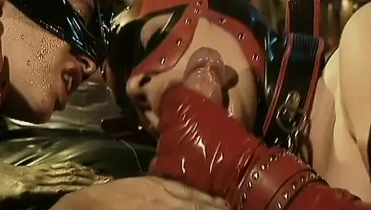 Masked German dominas having fun with their male servant