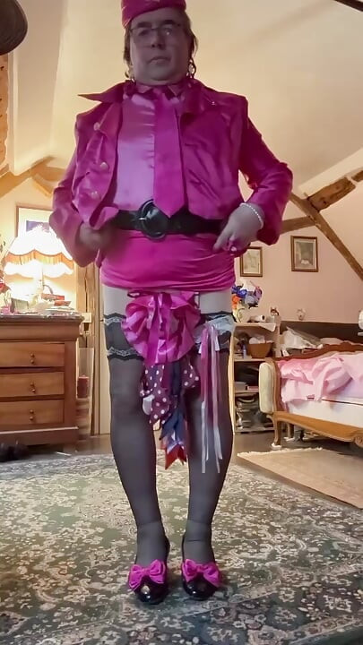 Dressed in a fuchsia miniskirt for her flight attendant party