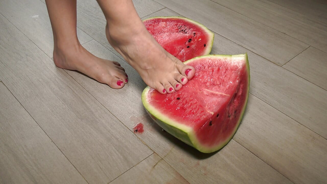 Busty MILF Presents Her Feet and Plays with a Watermelon
