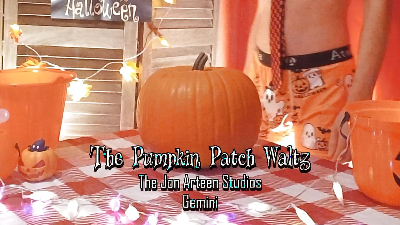 Cute twink Jon Arteen performs a sensual dance while carving a Halloween pumpkin