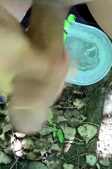 Balls Stretching Outdoor with Bucket Filled with Water and Jerk off