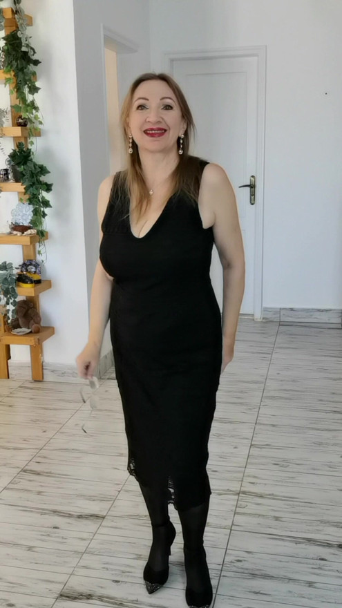 Hot granny teasing by black stockings and beautifull legs