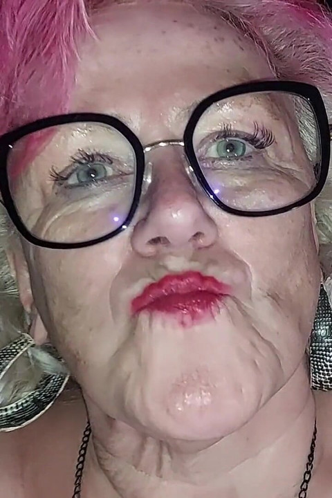 Granny Slut in Shiny Boots Teases Massive Tits Exposed