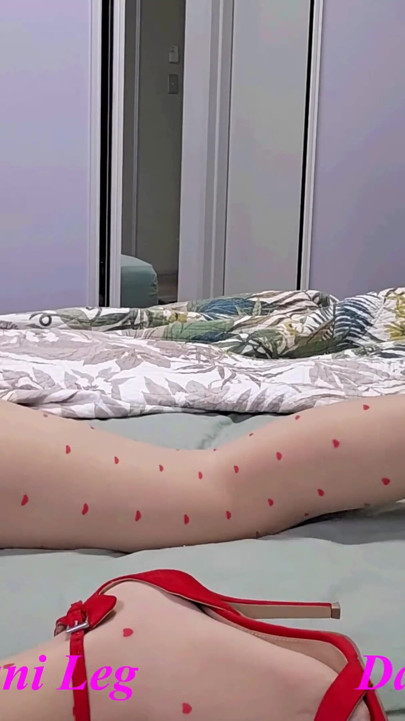 Dani Leg Fountain Cum in Red Spot Pantyhose