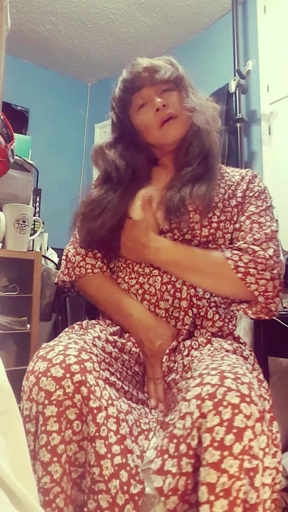 Lady Jhazmeena CD Touching Her Bra