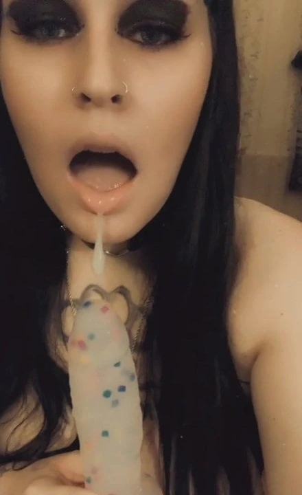 Goth slut bunny giving her cute dildo sloppy head