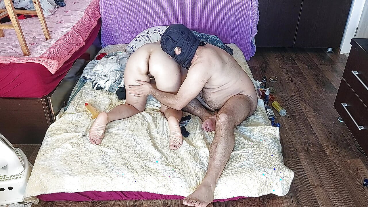 Sensual massage of a sexy couple with oil on the body.