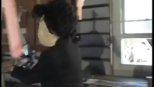 Two guys watch a slutty blond get fucked in her pussy by a machine