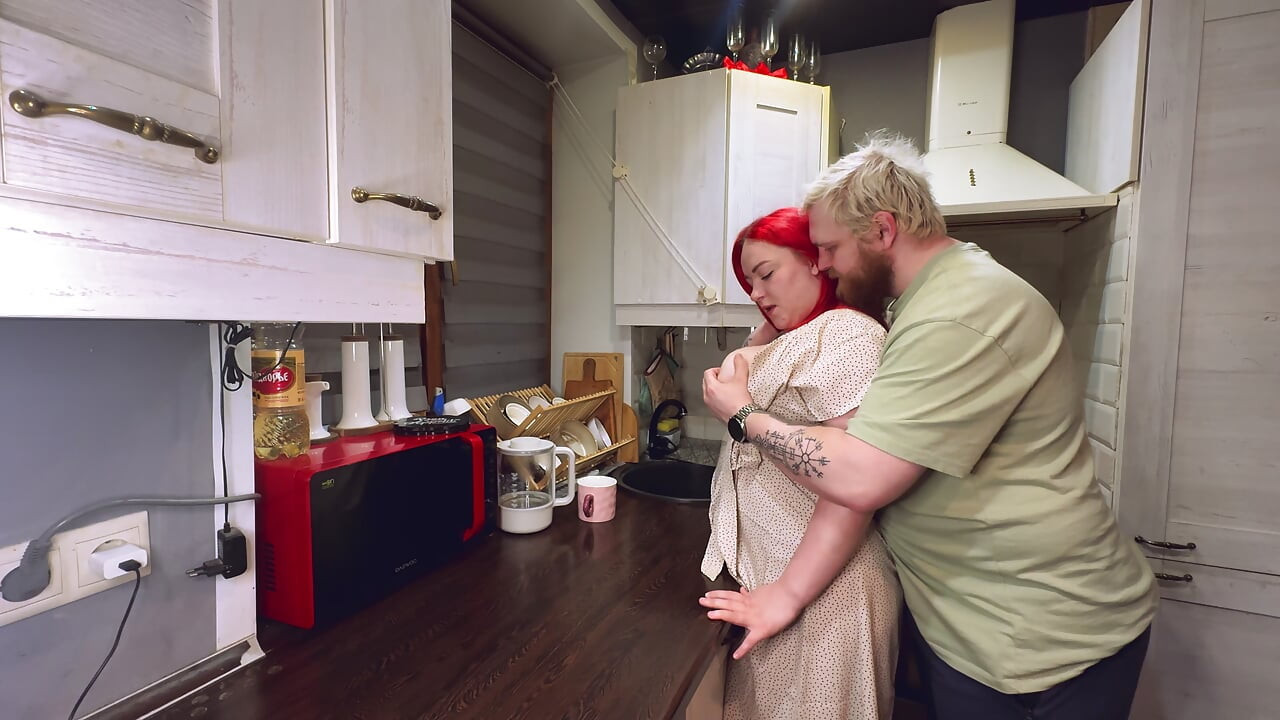 Sex in the kitchen with a red-haired wife. .