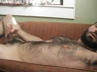 Furry man masturbating and shooting