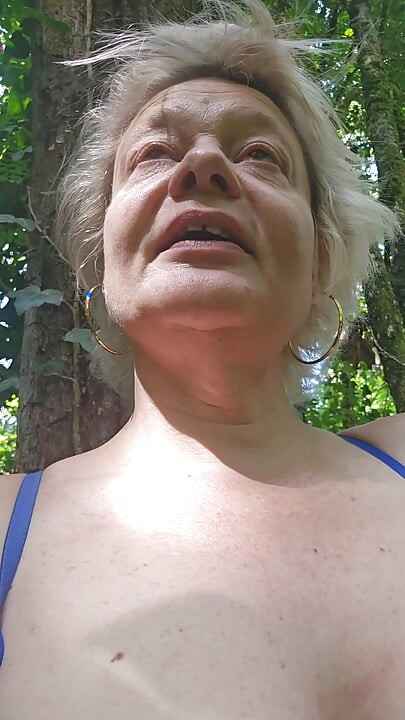 I was touching myself in the woods when a voyeur caught me and fucked my pussy.